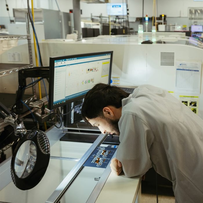 A Milwaukee Electronics employee at work